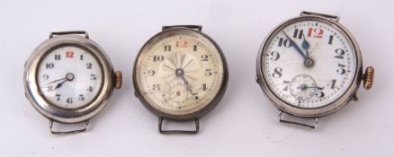 Mixed Lot: three various early 20th century silver cased wristwatches, comprising two ladies lever