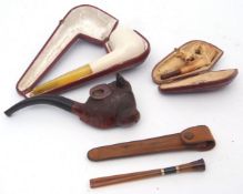 Mixed Lot: two various cased Meerschaum smoking pipes together with a further bull's head briar