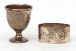 Mixed Lot: plain silver egg cup and oval napkin ring, combined wt approx 66gms, various dates and