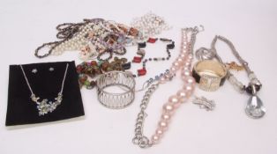 Large box quantity of costume jewellery to include plastic bead necklaces, torque bangles, various