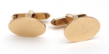 Pair of 9ct gold cufflinks, plain polished oval panels, with swivel fittings, hallmarked