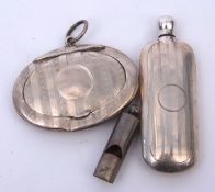 Mixed Lot: oval silver powder compact with hinged cover and ring suspension together with a small