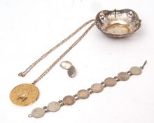 Mixed Lot: small pierced bon-bon dish, coin bracelet, single silver cuff link and silver pendant