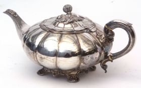 Mid-19th century silver on copper tea pot of compressed melon form with hinged cover, width 30cms