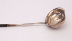 19th century Coin silver and whalebone toddy ladle, the plain polished oval bowl (repaired) to a