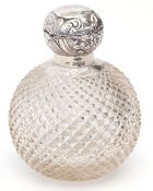 Late Victorian silver lidded and clear glass toilet water bottle, the spherical body with moulded