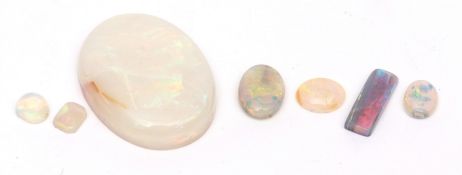 Mixed Lot: 7 circular boxed opals, 0.25-15.70ct approx (7)