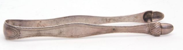 Pair of late 18th century bright cut feather edged sugar tongs, with initialled bridge and acorn