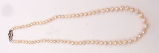 Single row of cultured pearls of graduated size, 6 - 3mm, to a 9ct stamped clasp set with three