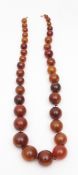 Vintage Bakelite singe row of graduated circular beads, 10-25mm, 370mm drop