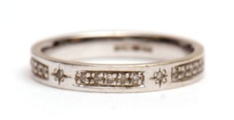 Precious metal diamond set half eternity ring, the plain polished band set with small diamonds (0.