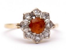 Precious metal diamond and citrine cluster ring, the faceted circular cut citrine claw set and