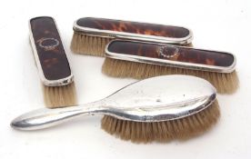 Mixed Lot: pair of silver mounted and tortoiseshell clothes brushes, together with a further
