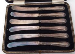 Cased set of six silver handled tea knives in a silk and velvet lined morocco covered case