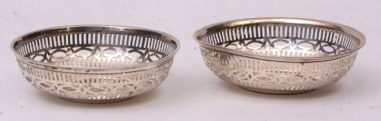 Two late Victorian bon-bon dishes, each of circular form with pierced galleries, diam 9.4cms,