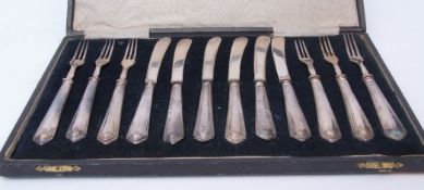 Cased set of six each dessert knives and forks, each with electro-plated blades and tines and hollow