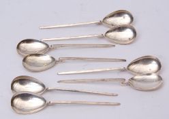 Eight Elizabeth II coffee spoons with oval bowls with applied and shaped square section handles,