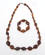Mixed Lot: modern toffee amber coloured graduated bead necklace, together with a matching