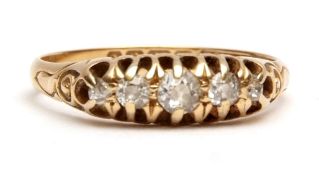 Early 20th century 18ct gold and diamond five stone ring having five graduated small diamonds,