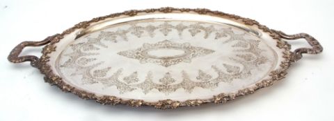 Late 19th century electro-plated oval two-handled tea tray, with fruiting vine applied border and