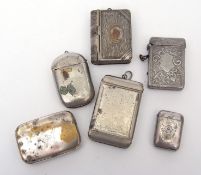 Mixed Lot: six various base metal vesta cases including one of book form with hinged and sprung