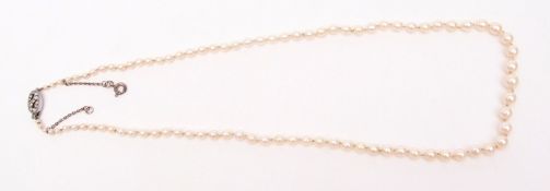 Single row of simulated graduated pearls (6mm to 1mm) to a sterling stamped paste set clasp, 260mm