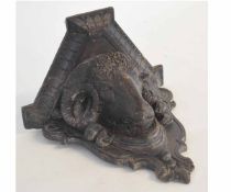 Victorian carved pine wall bracket modelled as a ram's head, 33cms wide x 33cms drop