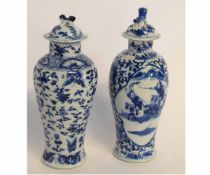 Pair of Chinese vases decorated with birds and flowers, one vase with a central panel of warriors,