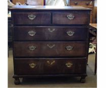 18th century oak two over three full width drawer chest with brass swan neck handles, raised on