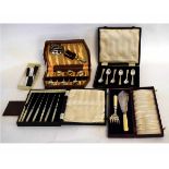 Box containing mixed silver plated boxed sets to include butter knives, bone handled fish servers,