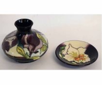 Modern Moorcroft squat vase with tube lined floral decoration, together with a pin dish with similar