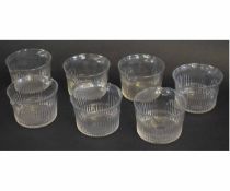 Collection of seven ribbed glass pouring bowls, 8cms high