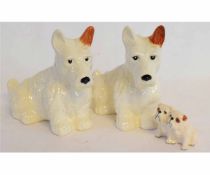Large pair of Beswick models of Highland terriers in typical colours, 16cms high, together with