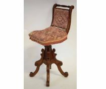 Victorian mahogany musician's chair with puce silk upholstered seat with buttoned detail, with