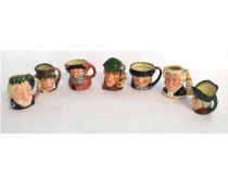 Collection of seven small Royal Doulton character jugs including The Sleuth, Paddy, Falstaff and