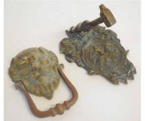 Vintage lion head door knocker together with a further vintage cast brass Mason's door knocker (2)