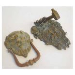 Vintage lion head door knocker together with a further vintage cast brass Mason's door knocker (2)