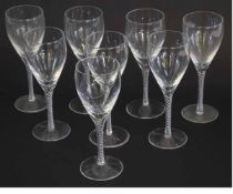 Group: eight wine glasses with air twist stems, 21cms high