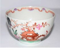Lowestoft tea bowl in the blackbird pattern (hairline), 7cms high