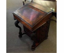 William IV rosewood Davenport with red leather insert to panel with a satinwood lined interior,