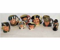 Collection of small Royal Doulton character jugs including Winston Churchill, Falstaff and Robin