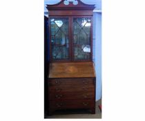 Edwardian mahogany and satinwood inlaid bureau bookcase, the top with swan neck pediment over two