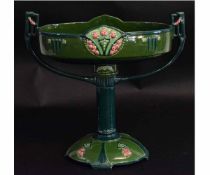 Eichwald oval two-handled pedestal bowl in green glaze with floral panels and stylised handles,