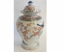 Large Chinese baluster jar and cover, decorated with polychrome decoration of birds on branches