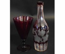 Bohemian style glass vase with a cranberry coloured finish, together with a similar cranberry