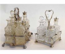 Silver plated six-bottle cruet and stand with central handle and four cut glass condiment bottles,