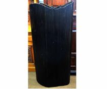 20th century black painted corrugated wrap-round screen, 150cms tall