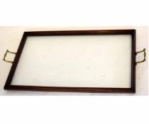 Mahogany framed glass tray with brass side handles, 73cms wide x 40cms deep