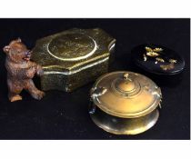 Lacquered oval and painted top snuff box, a small model of a Black Forest bear, an etched Indian