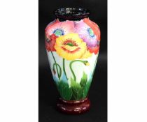 Modern J McCall baluster vase with a multi-coloured pansy decoration in the Moorcroft manner, with